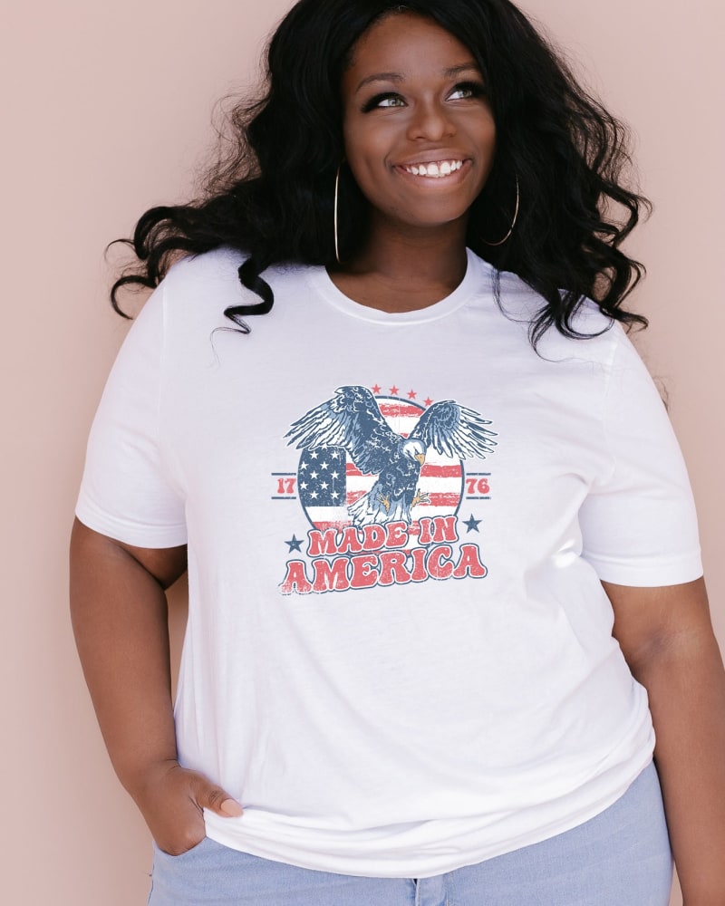 Front of a model wearing a size Large Retro Made In America in White by Simply Sage Market. | dia_product_style_image_id:281767